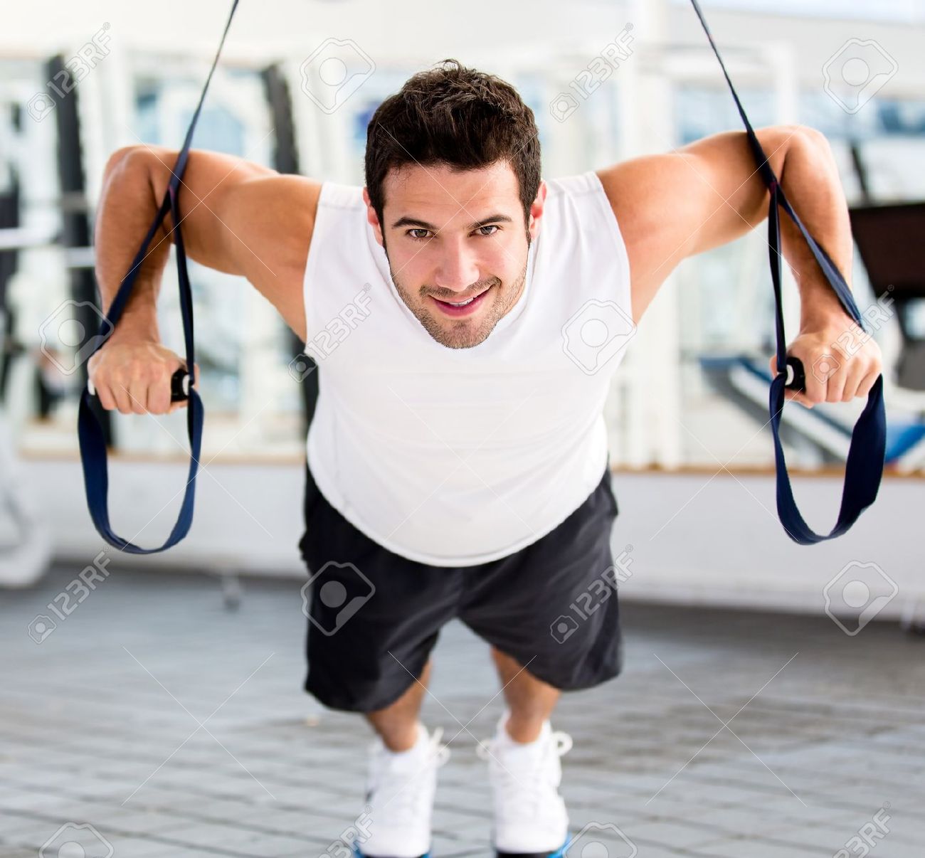 14710061-strong-handsome-man-exercising-at-the-gym-stock-photo-fitness
